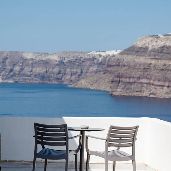 Private balcony with chairs and Caldera sea view at Santorini View Hotel in Akrotiri, Santorini
