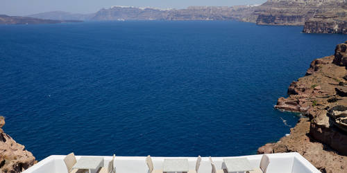 
Santorini View Hotel terrace with table seats and caldera view