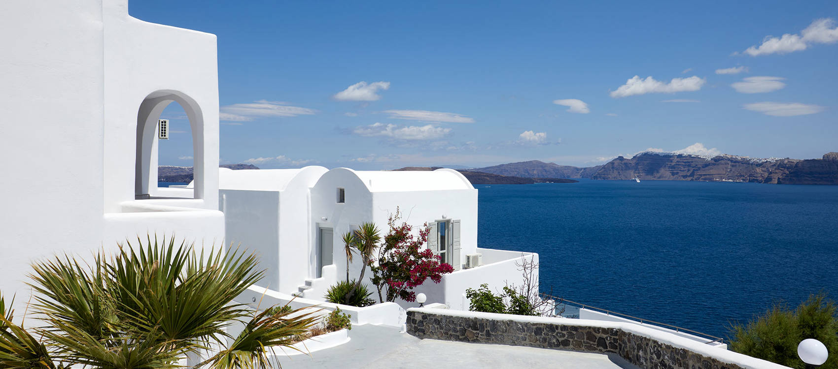 White Terraces And Mediterranean Sea View On Santorini Greece High