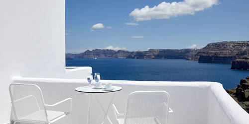 
Santorini View Hotel white balcony with sea view, under the blue sky