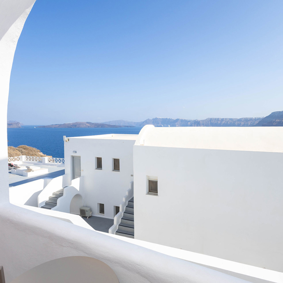 Balcony view from the Standard Room overlooking the Aegean Sea and caldera at Santorini View Hotel