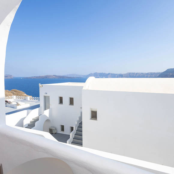 Balcony view from the Standard Room overlooking the Aegean Sea and caldera at Santorini View Hotel