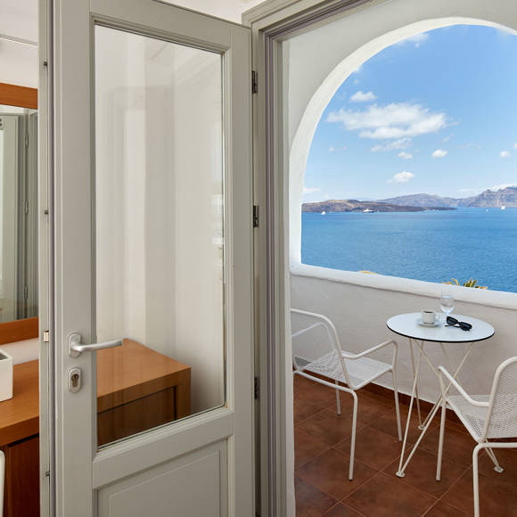 Balcony of Classic Double room with Caldera view and coffee table at Santorini View Hotel