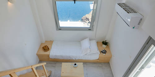 
Santorini View Hotel bedroom with single bed, big window with sea view and air-condition